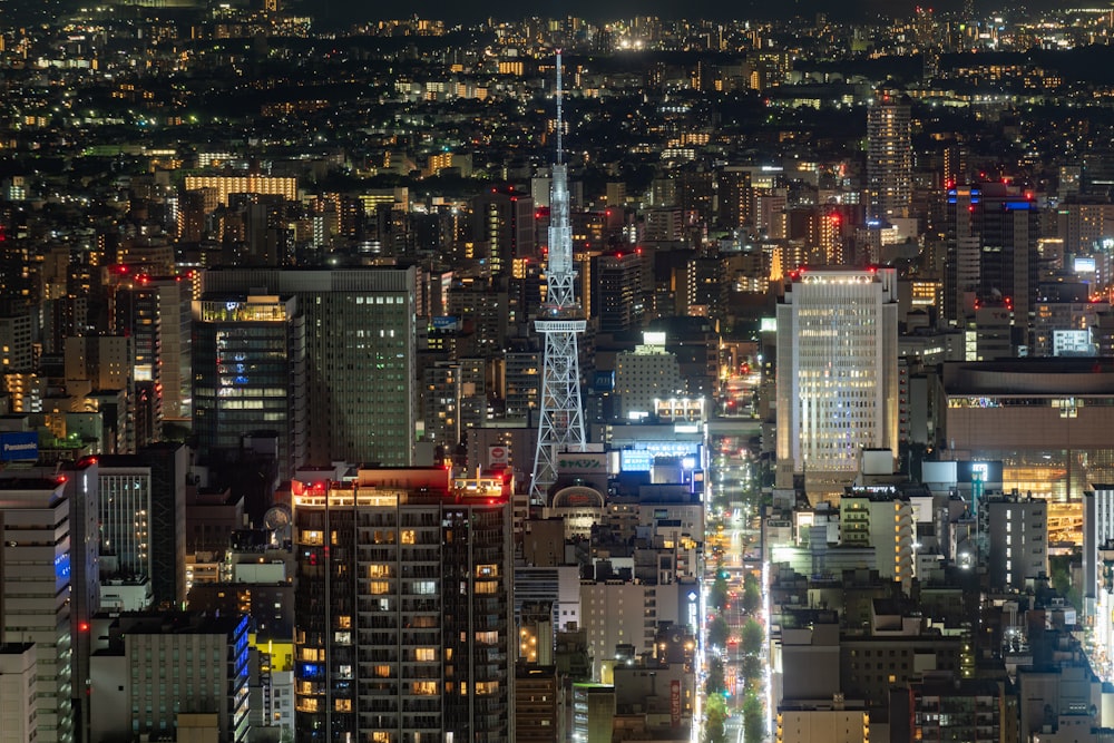 a view of a city at night from the top of a building