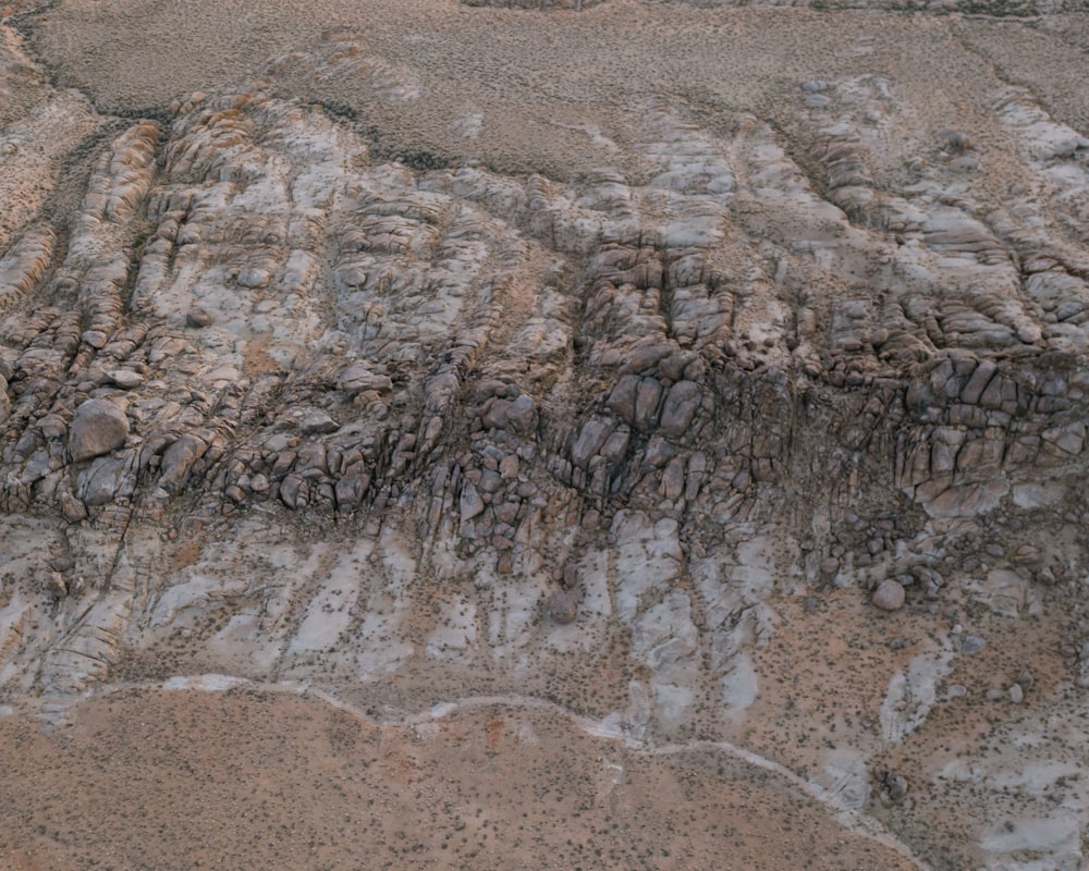 an aerial view of a rock formation in the desert