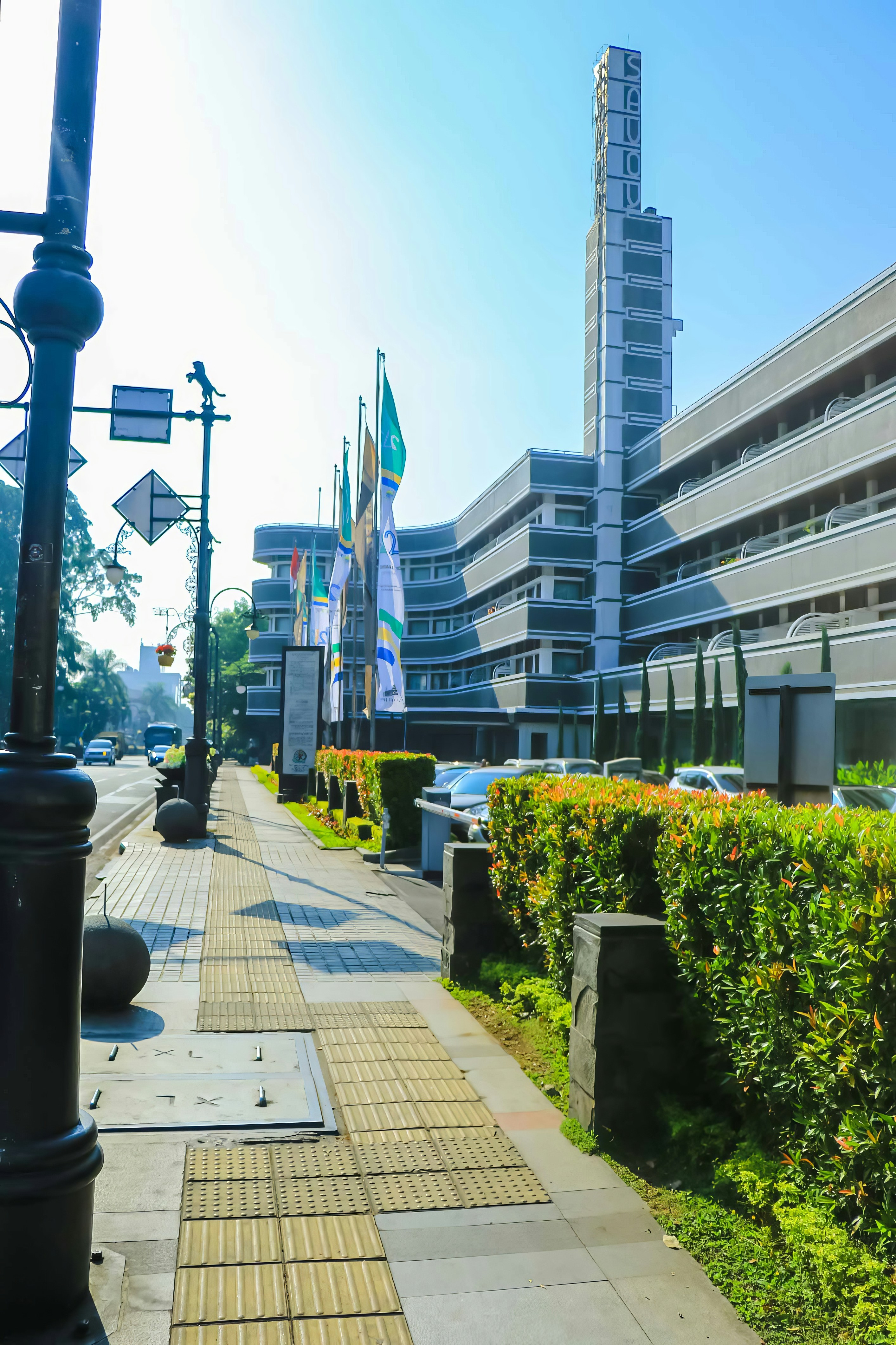 a city street lined with lots of tall buildings