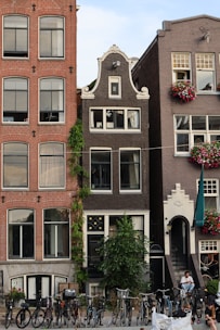 a group of bicycles parked in front of a building