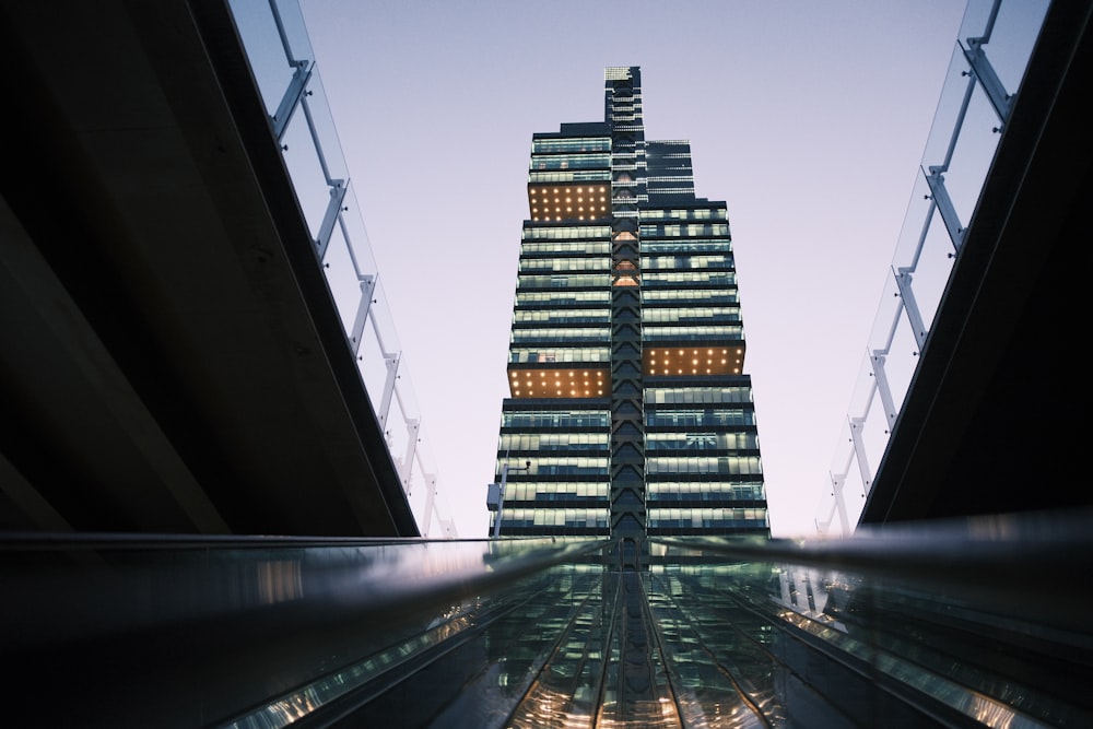 a very tall building towering over a city