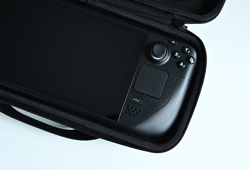 a close up of a nintendo wii game controller in a case