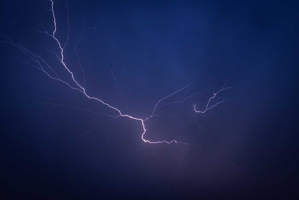 a lightning bolt is seen in the sky