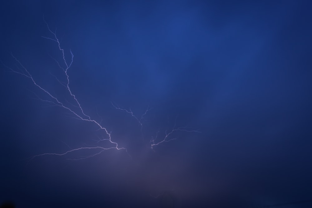 a lightning bolt is seen in the sky