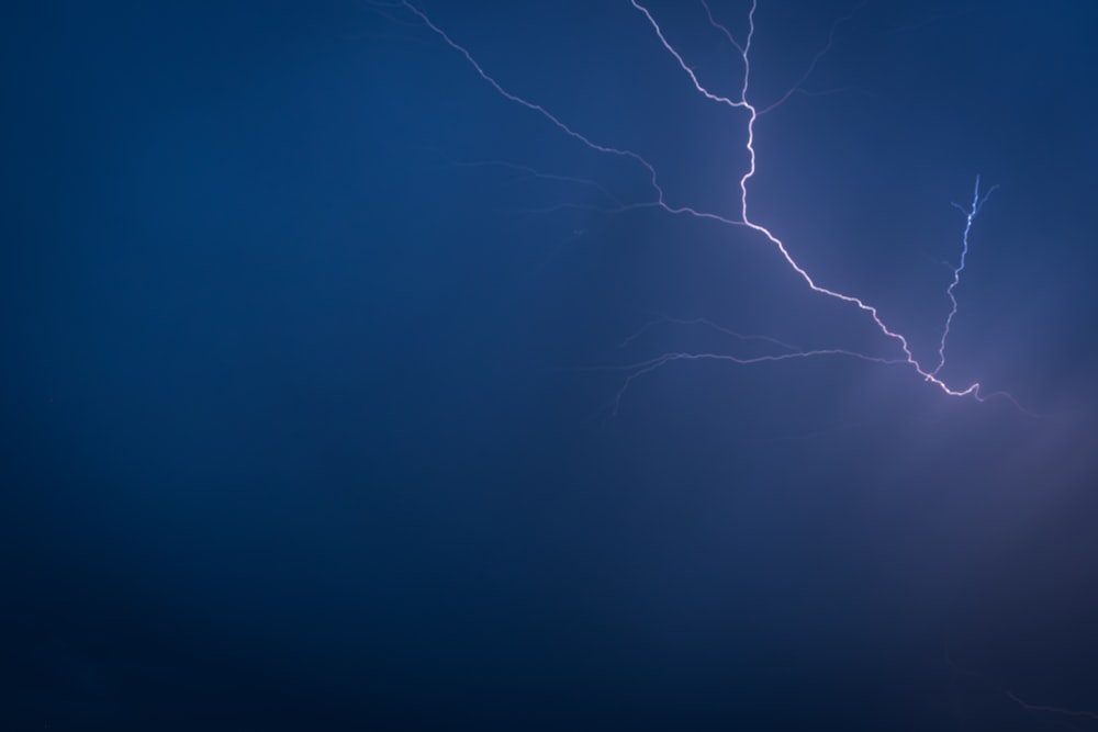 a lightning bolt is seen in the sky