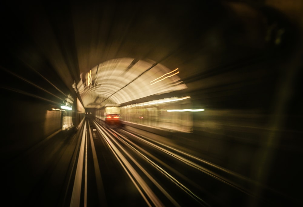 a train traveling through a tunnel at night