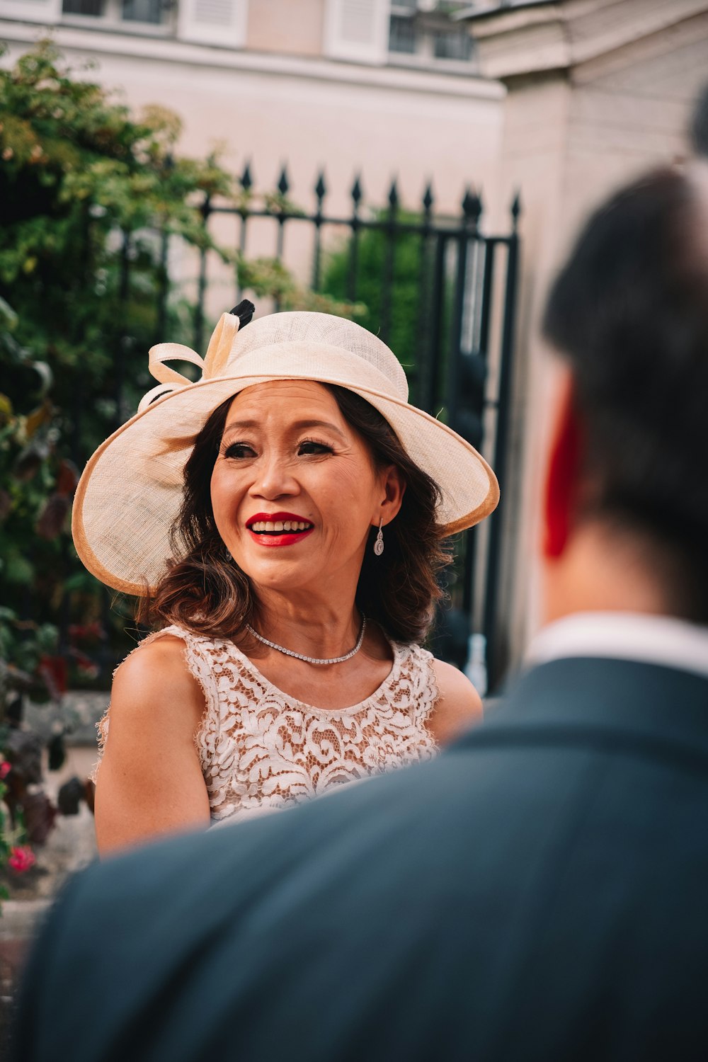 a woman in a white dress and a man in a suit