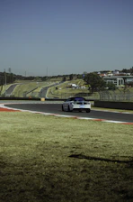 The academy’s two-mile enclosed driving track featuring hills, curves, and docks for realistic practice.