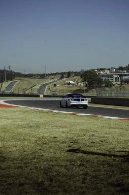 Students practicing on the two-mile enclosed driving track featuring hills, curves, and intersections.