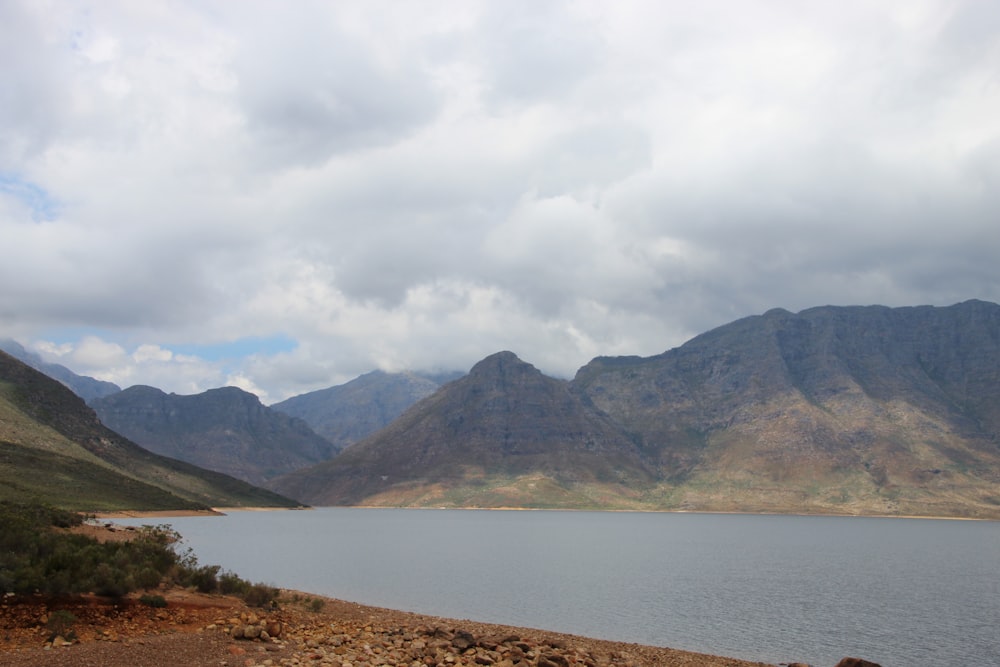 a large body of water surrounded by mountains