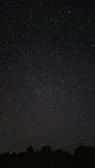 Illustration of a magical night sky with stars shaped like storybook characters.