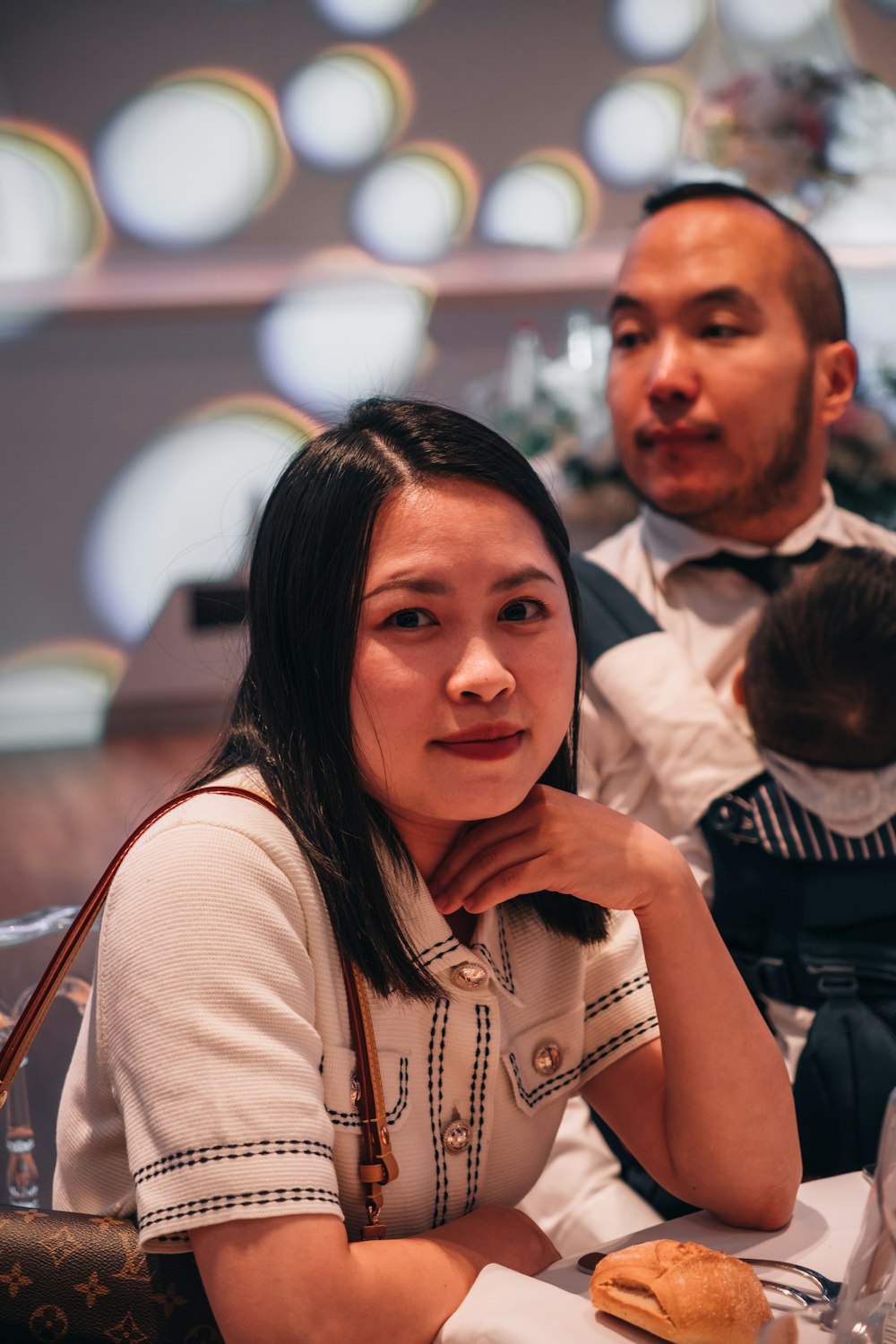 a woman and a man sitting at a table