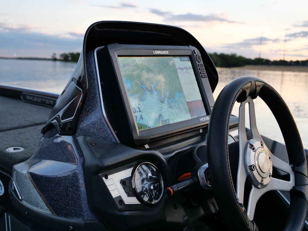 a gps device mounted to the side of a boat