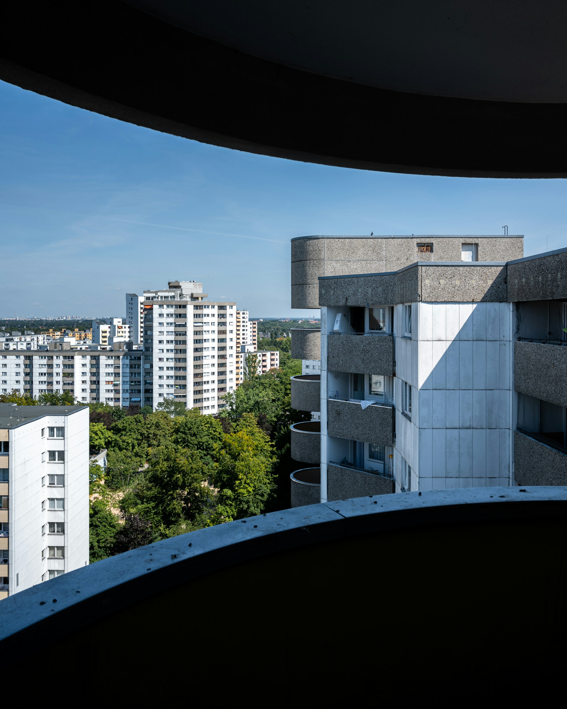 a view of a city from a window in a building