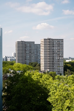 A beautiful view of Kooyong Apartments surrounded by lush greenery.