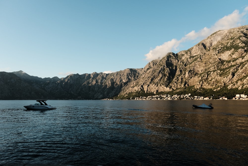 a boat floating on top of a large body of water