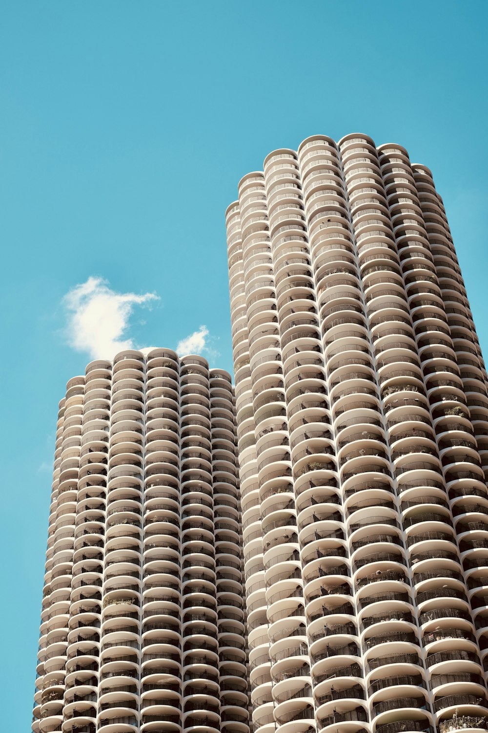 a tall building with a sky background