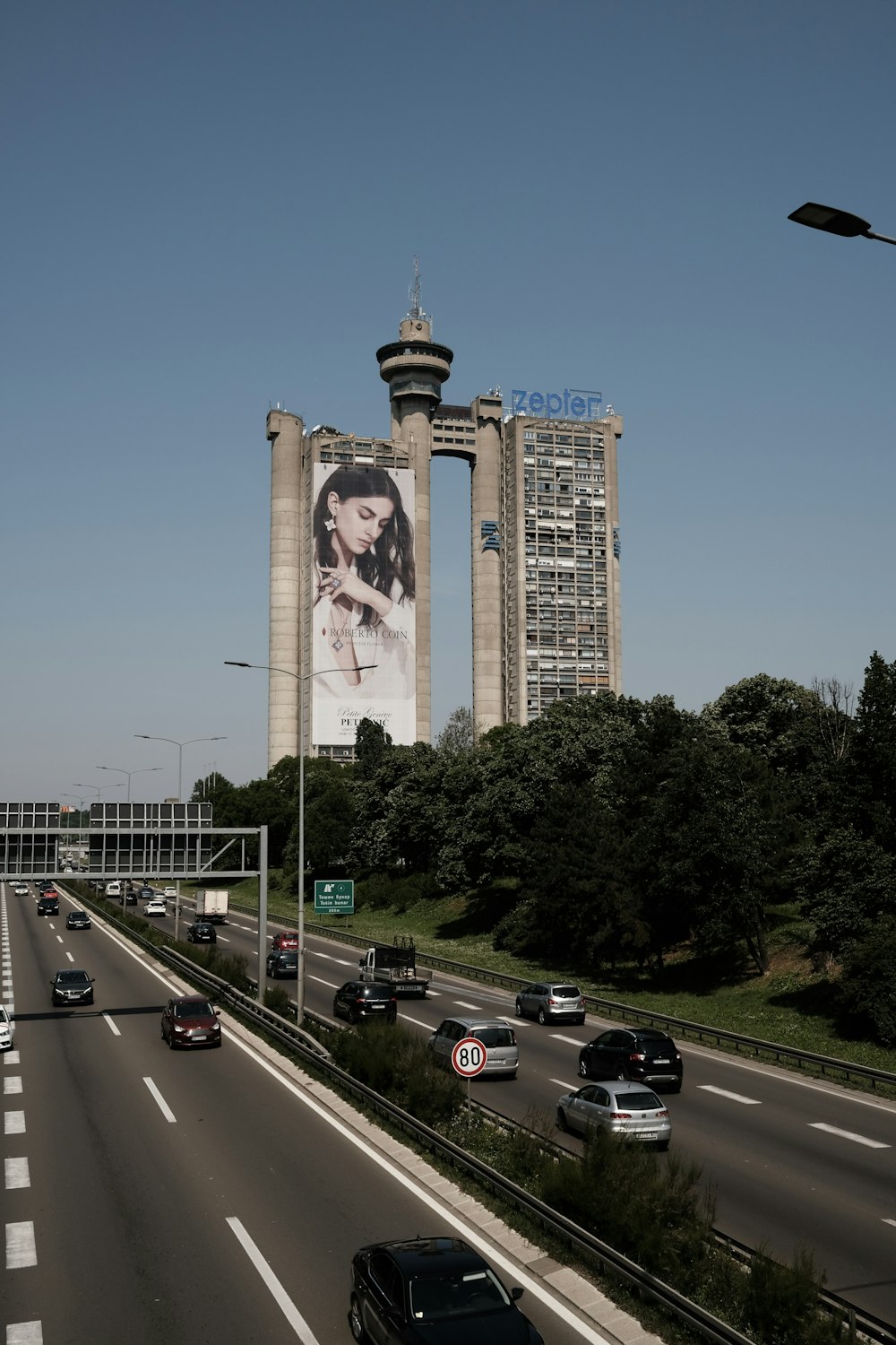 a large billboard on the side of a highway