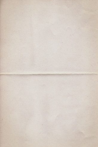 a piece of white paper with a brown border