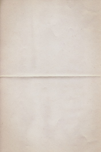 a piece of white paper with a brown border