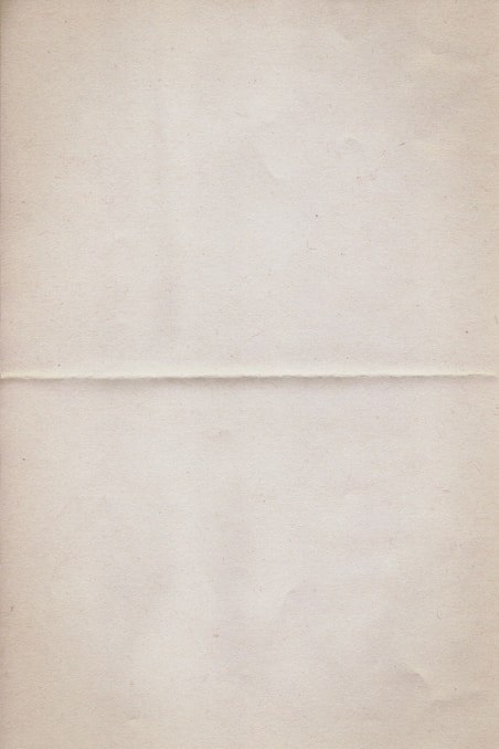 a piece of white paper with a brown border