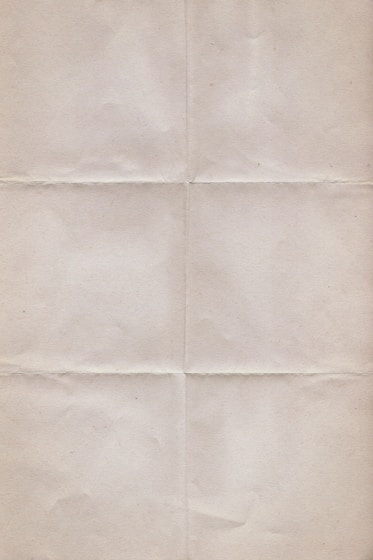 a piece of white paper with a black cat on it