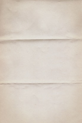 a piece of white paper with a brown border