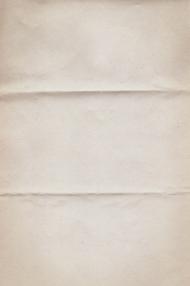 a piece of white paper with a brown border