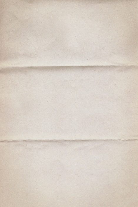 a piece of white paper with a brown border