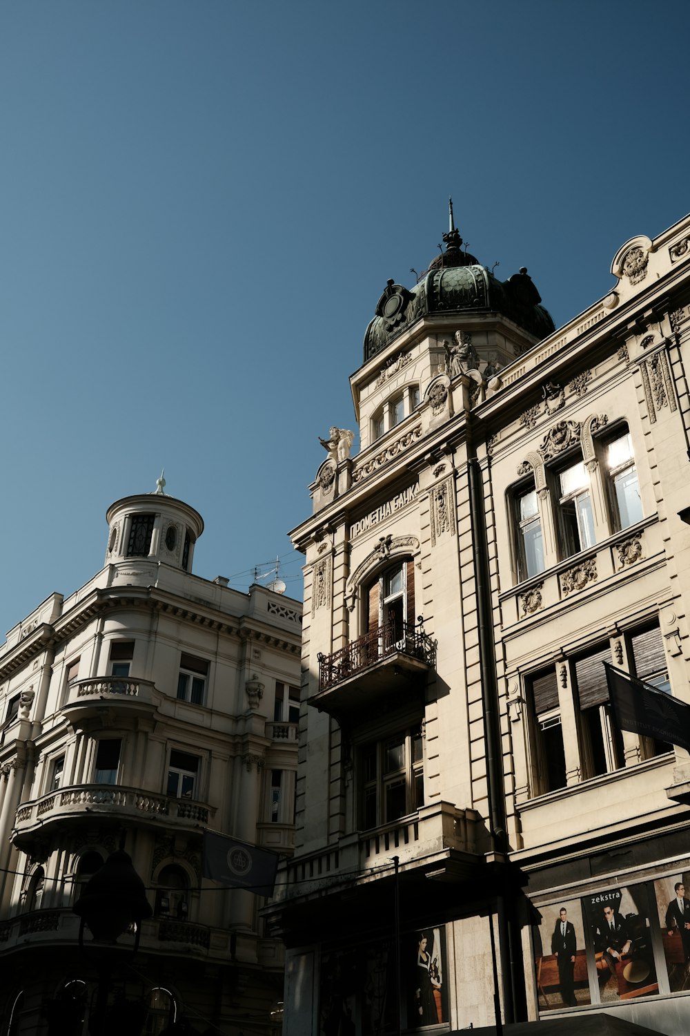 a tall building with a clock on the top of it