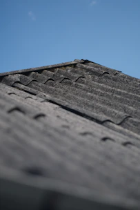 Close-up of RV roof being inspected and repaired.
