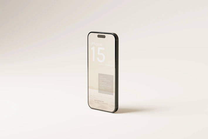 Close-up of a sleek iPhone 15 displayed on a black and gold background, highlighting its premium design.