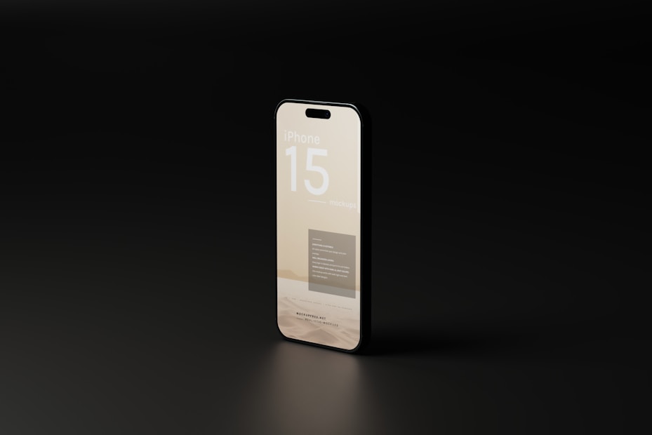 A modern smartphone displayed at an angle on a dark surface with a minimalistic interface. The text on the screen reads 'iPhone 15 mockups.' The phone has a sleek, reflective surface with a muted color scheme that accentuates its smooth design.