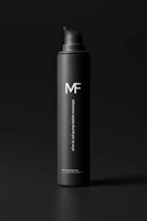 A sleek black pump bottle with a matte finish stands against a dark background. The letters 'MF' are prominently displayed in white on the upper part of the bottle. Beneath it, in smaller white text, there is a description indicating 'slim & tall pump bottle mockups.' The overall aesthetic is minimalistic and elegant.