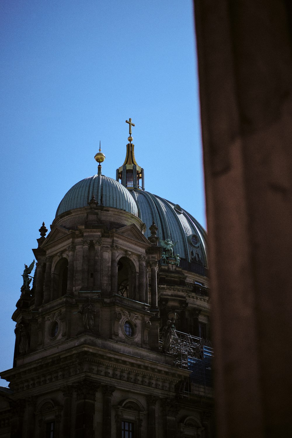 the dome of a building with a cross on top