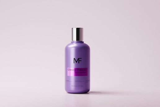 a bottle of hair care product on a white background