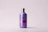A vibrant beverage bottle featuring a glossy label with spot UV highlights.