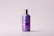 A vibrant beverage bottle featuring a glossy label with spot UV highlights.