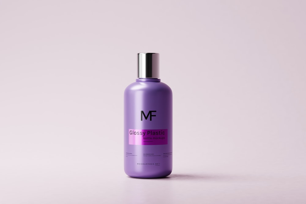 a bottle of hair care product on a white background