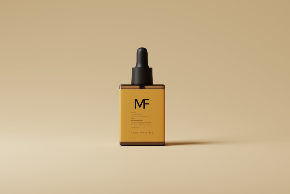 a bottle of mf hair oil on a beige background