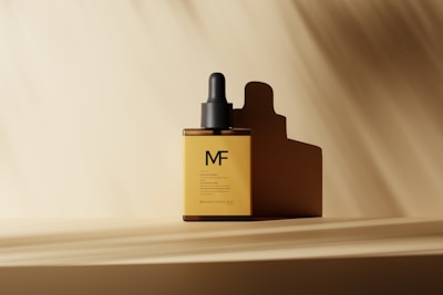 A close-up of a sleek serum bottle with a dropper against a minimalist background.