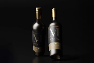 Close-up of luxury beverage packaging with elegant gold details on a dark background.