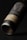 A close-up view of a wine bottle with a minimalist and elegant design. The label features large, stylized letters and subtle text beneath. The bottle is tilted on its side against a dark background, emphasizing the sleek and polished appearance.
