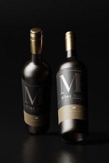 Elegant gold foil labels on premium wine bottles.