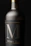 Close-up of a premium customized water bottle with elegant gold and black label design.