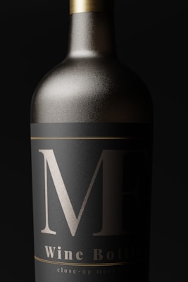 A close-up view of an elegantly designed wine bottle with a matte black label and bold silver markings. The bottle appears metallic, with a sleek, sophisticated look.