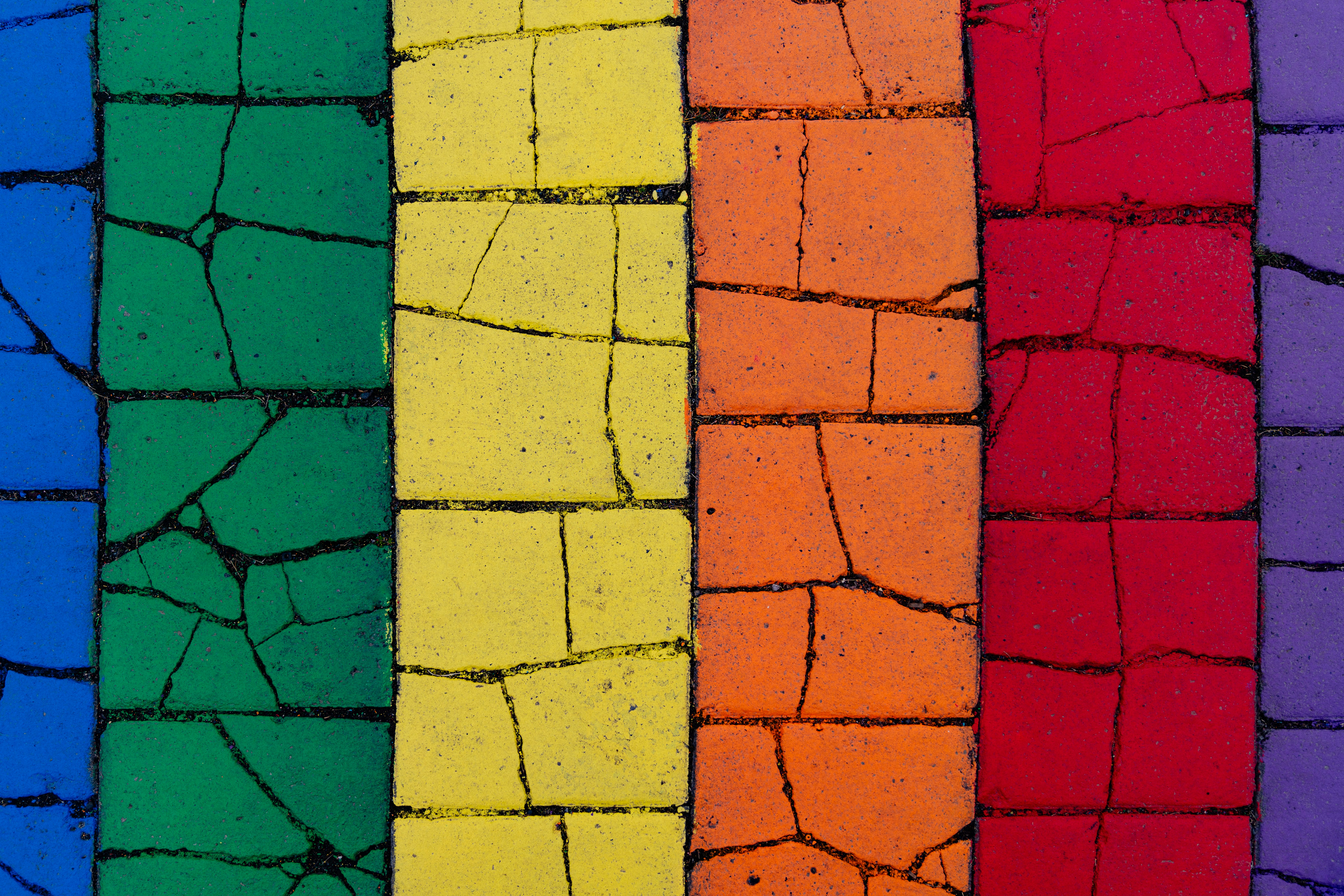 a close up of a rainbow colored brick wall, Rainbow Road