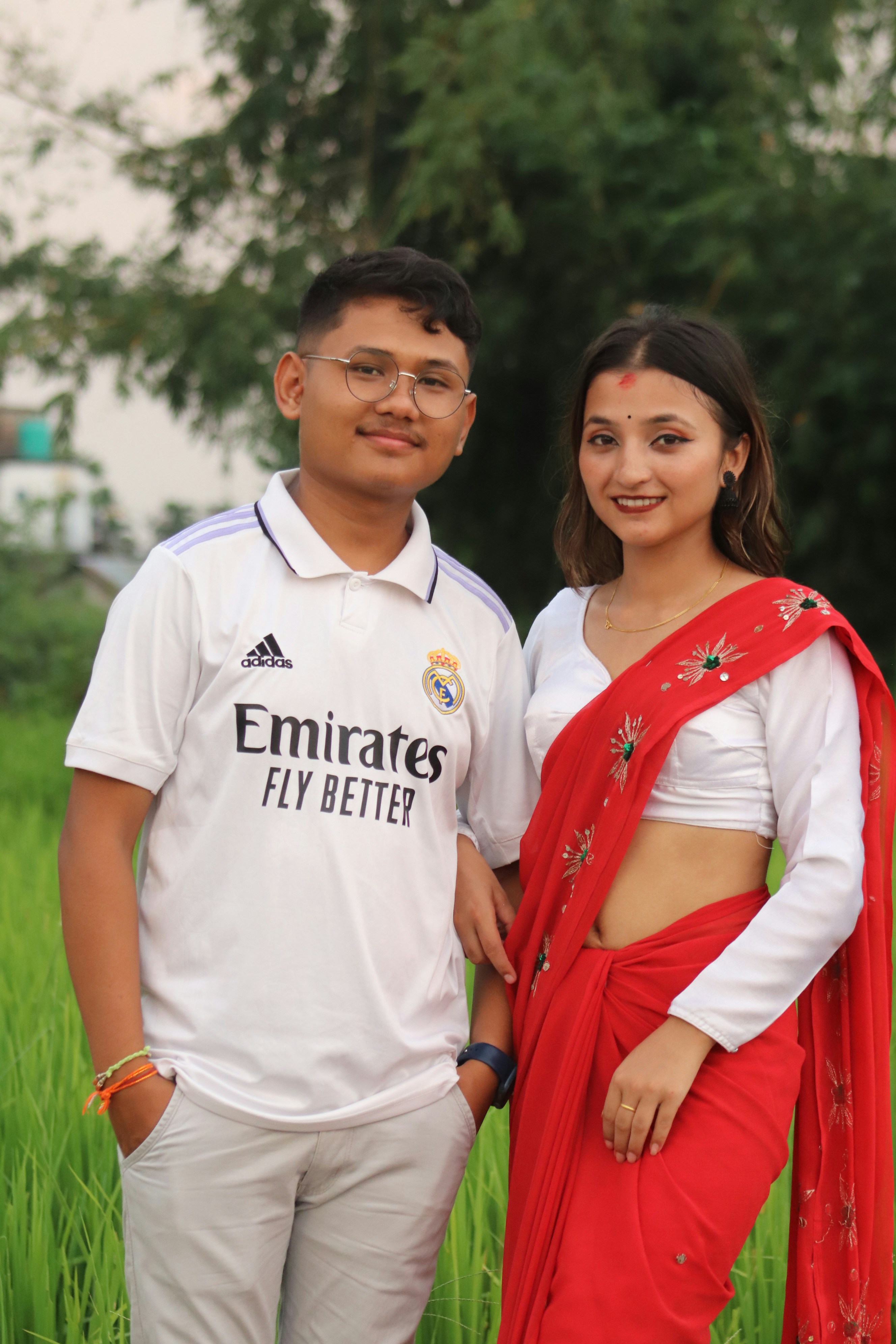 a man and a woman standing next to each other