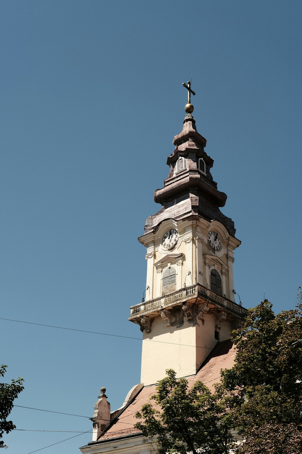 a tall tower with a clock on the top of it