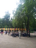 An outdoor performance by students in a park.